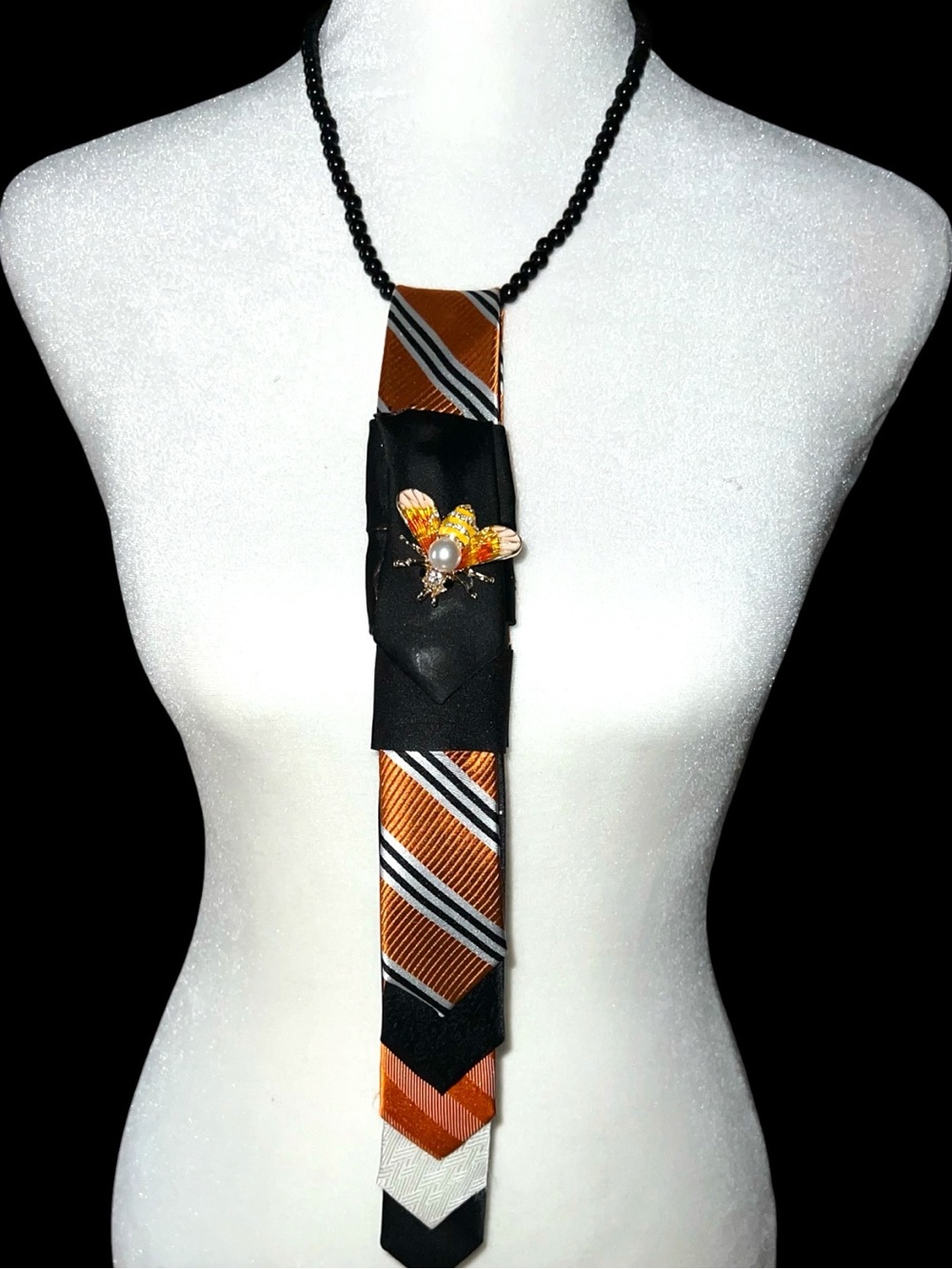 Handcrafted Orange Striped  Tie Necklace with Black Accents and bumblebee
